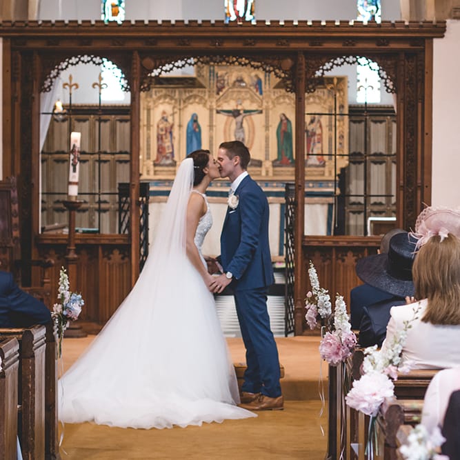 Wedding Ceremony | Bride in Beaded Halterneck Gown with Tulle Skirt and Spaghetti Straps by Maggie Sottero | Groom in Royal Blue Suit from Suit Supply and Tan Brogues from Barker | Halterneck Maggie Sottero Dress and Garden Games at Gate Street Barn | Story + Colour Photography