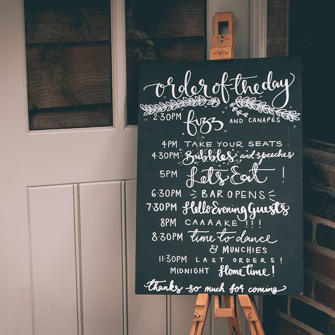 Wedding Reception Decor | Order of the Day Sign | Halterneck Maggie Sottero Dress and Garden Games at Gate Street Barn | Story + Colour Photography