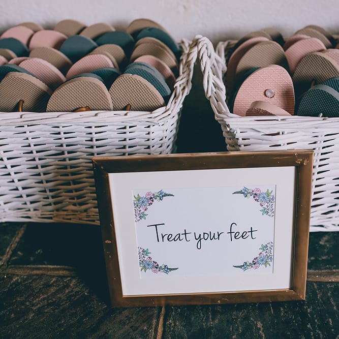 Wedding Reception | Baskets of Flip Flops | Halterneck Maggie Sottero Dress and Garden Games at Gate Street Barn | Story + Colour Photography