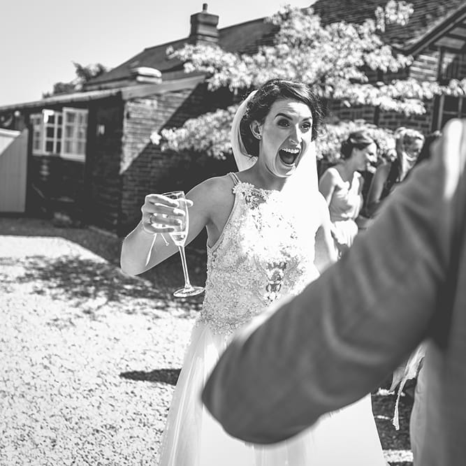 Wedding Reception | Bride in Beaded Halterneck Gown with Tulle Skirt and Spaghetti Straps by Maggie Sottero | Halterneck Maggie Sottero Dress and Garden Games at Gate Street Barn | Story + Colour Photography