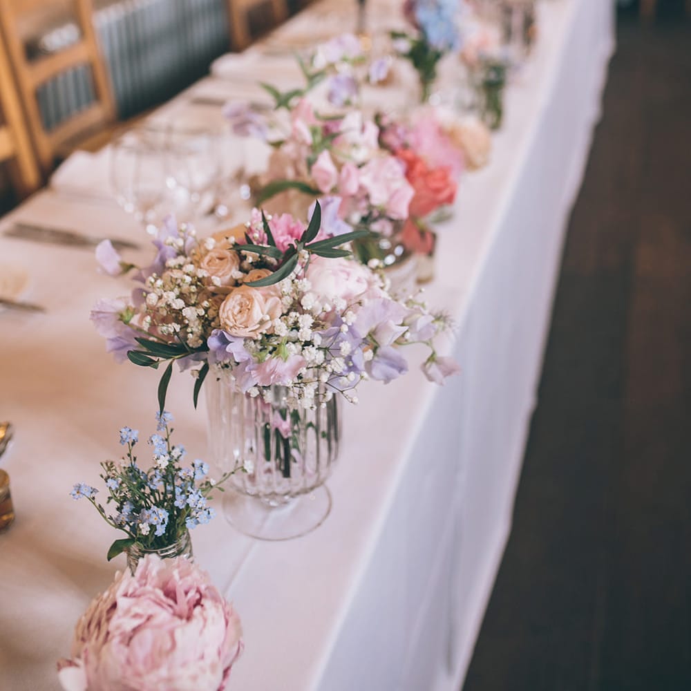 Wedding Reception Decor | Top Table | Pastel Flowers | Halterneck Maggie Sottero Dress and Garden Games at Gate Street Barn | Story + Colour Photography