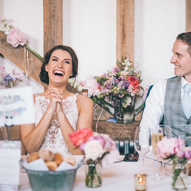 Speeches | Bride in Beaded Halterneck Gown with Tulle Skirt and Spaghetti Straps by Maggie Sottero | Groom in Royal Blue Suit and Pastel Blue Tie from Suit Supply | Top Table | Pastel Flowers | Halterneck Maggie Sottero Dress and Garden Games at Gate Street Barn | Story + Colour Photography