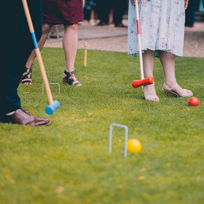 Wedding Reception | Lawn Games | Croquet | Halterneck Maggie Sottero Dress and Garden Games at Gate Street Barn | Story + Colour Photography