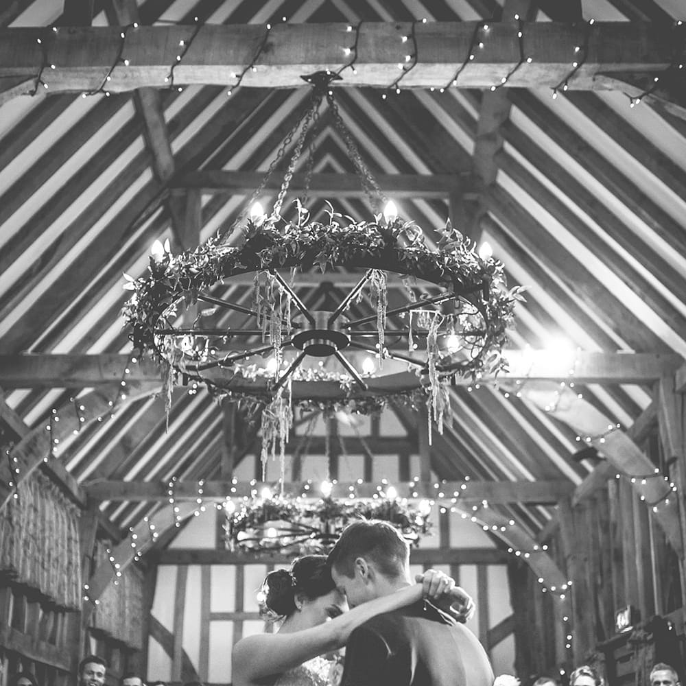 First Dance | Bride in Beaded Halterneck Gown with Tulle Skirt and Spaghetti Straps by Maggie Sottero | Groom in Royal Blue Suit and Pastel Blue Tie from Suit Supply | Hair Vine from Etsy | Foliage Light Installation | Halterneck Maggie Sottero Dress and Garden Games at Gate Street Barn | Story + Colour Photography