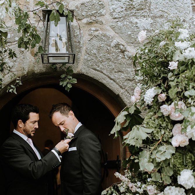 Groom in Church Entrance Before Ceremony