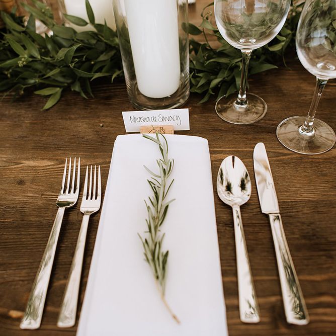 Table Setting with Herbs and Candle
