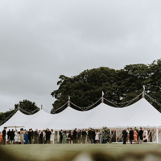 Tent Wedding with Guests on Farm