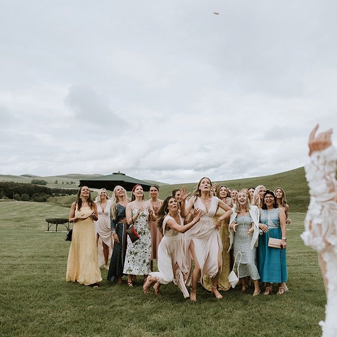 Bride Throws Bouquet to Wedding Party