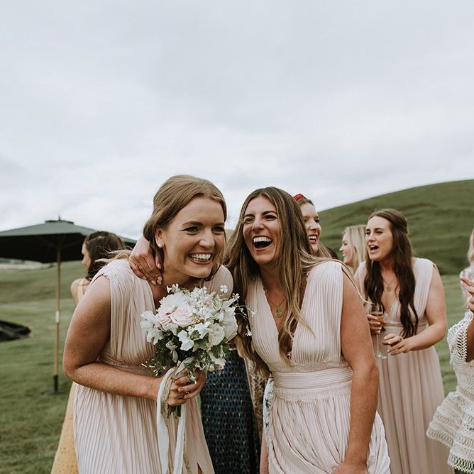Guests Enjoy Day aft Bouquet Toss