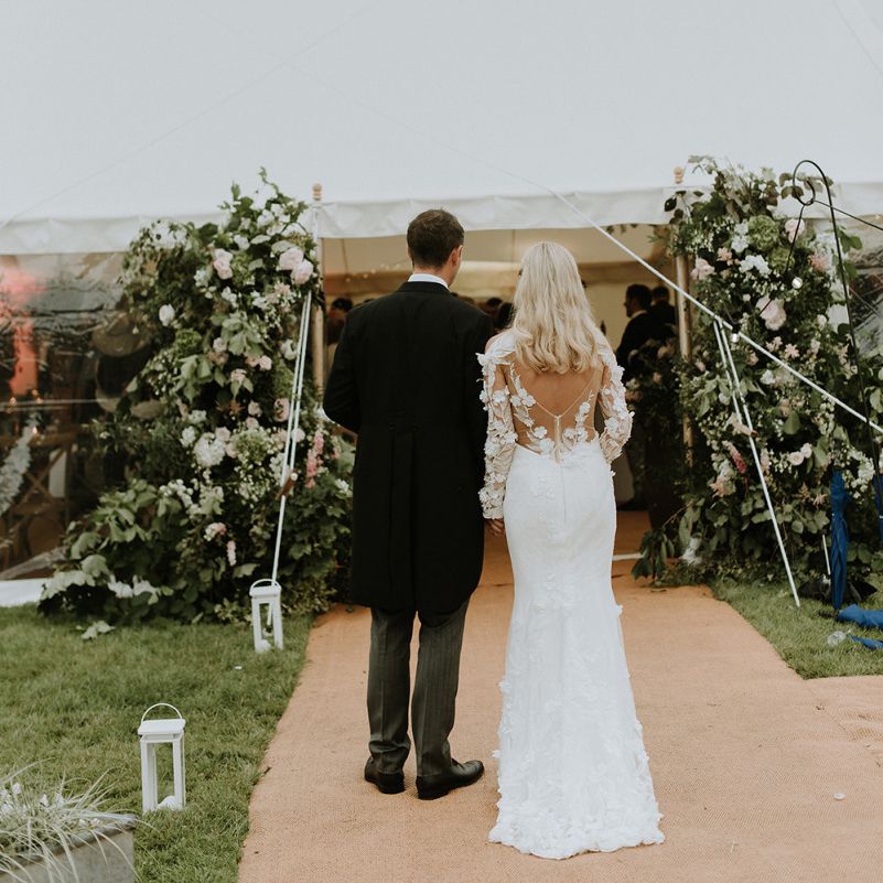 Bride and Groom Entering Reception Tent