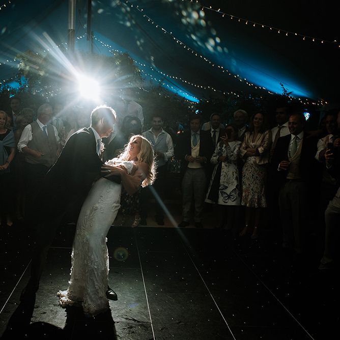 Bride &amp; Groom Dancing in Tent Wedding Venue During Reception