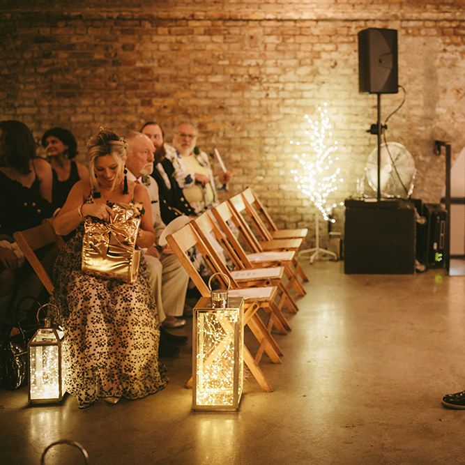 Wedding Ceremony | Groom in Grey Puppy Tooth Check Two-Piece Paul Smith Suit with Amber Tie Pin, Pocket Square and Braces | Bike Shed Motorcycle Club Wedding for ELLE Digital Editor | Nigel John Photography