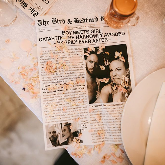 Fish Course Wrapped in Newspaper Article about Bride and Groom's Haphazard First Date | Bike Shed Motorcycle Club Wedding for ELLE Digital Editor | Nigel John Photography