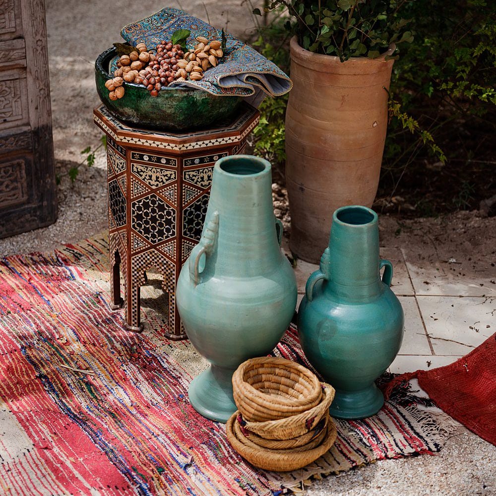 Ceramic Pots | Wooden Door Altar | Moroccan Rugs | Outdoor Ceremony Wedding Decor | Paradise Destination Wedding at Jnane Tamsna in Marrakech, Morocco | Nordica Photography | Matteo Castelluccia Film