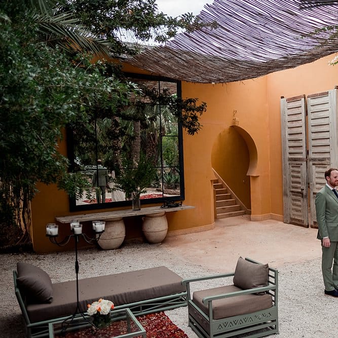 Bride in rue de Seine Bridal Gown | Groom in Green Beggars Run Suit | Paradise Destination Wedding at Jnane Tamsna in Marrakech, Morocco | Nordica Photography | Matteo Castelluccia Film