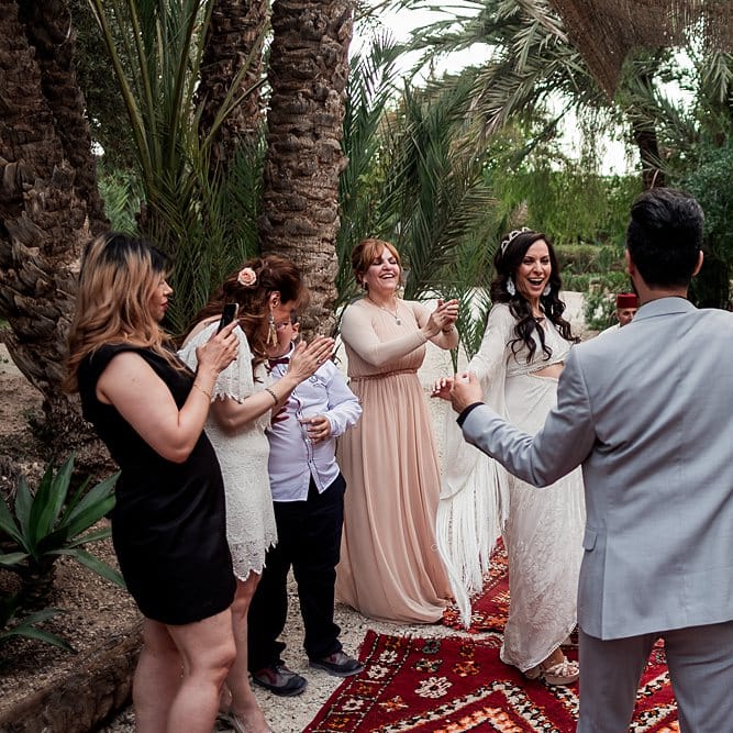 Bride in rue de Seine Bridal Gown | Groom in Green Beggars Run Suit | Paradise Destination Wedding at Jnane Tamsna in Marrakech, Morocco | Nordica Photography | Matteo Castelluccia Film