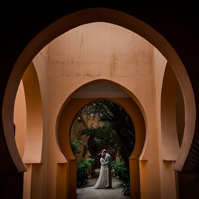 Bride in rue de Seine Bridal Gown | Groom in Green Beggars Run Suit | Paradise Destination Wedding at Jnane Tamsna in Marrakech, Morocco | Nordica Photography | Matteo Castelluccia Film