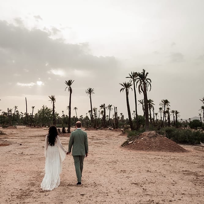 Bride in rue de Seine Bridal Gown | Groom in Green Beggars Run Suit | Paradise Destination Wedding at Jnane Tamsna in Marrakech, Morocco | Nordica Photography | Matteo Castelluccia Film