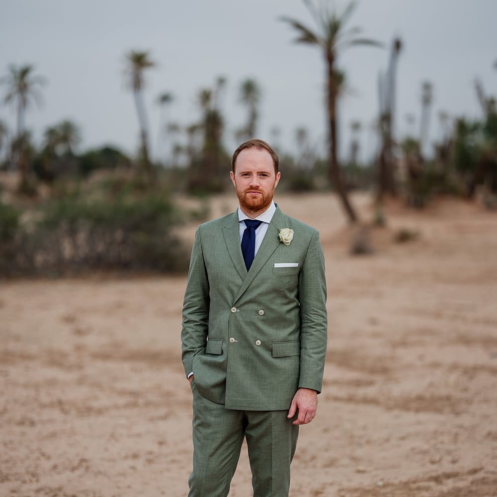 Groom in Green Beggars Run Suit | Paradise Destination Wedding at Jnane Tamsna in Marrakech, Morocco | Nordica Photography | Matteo Castelluccia Film