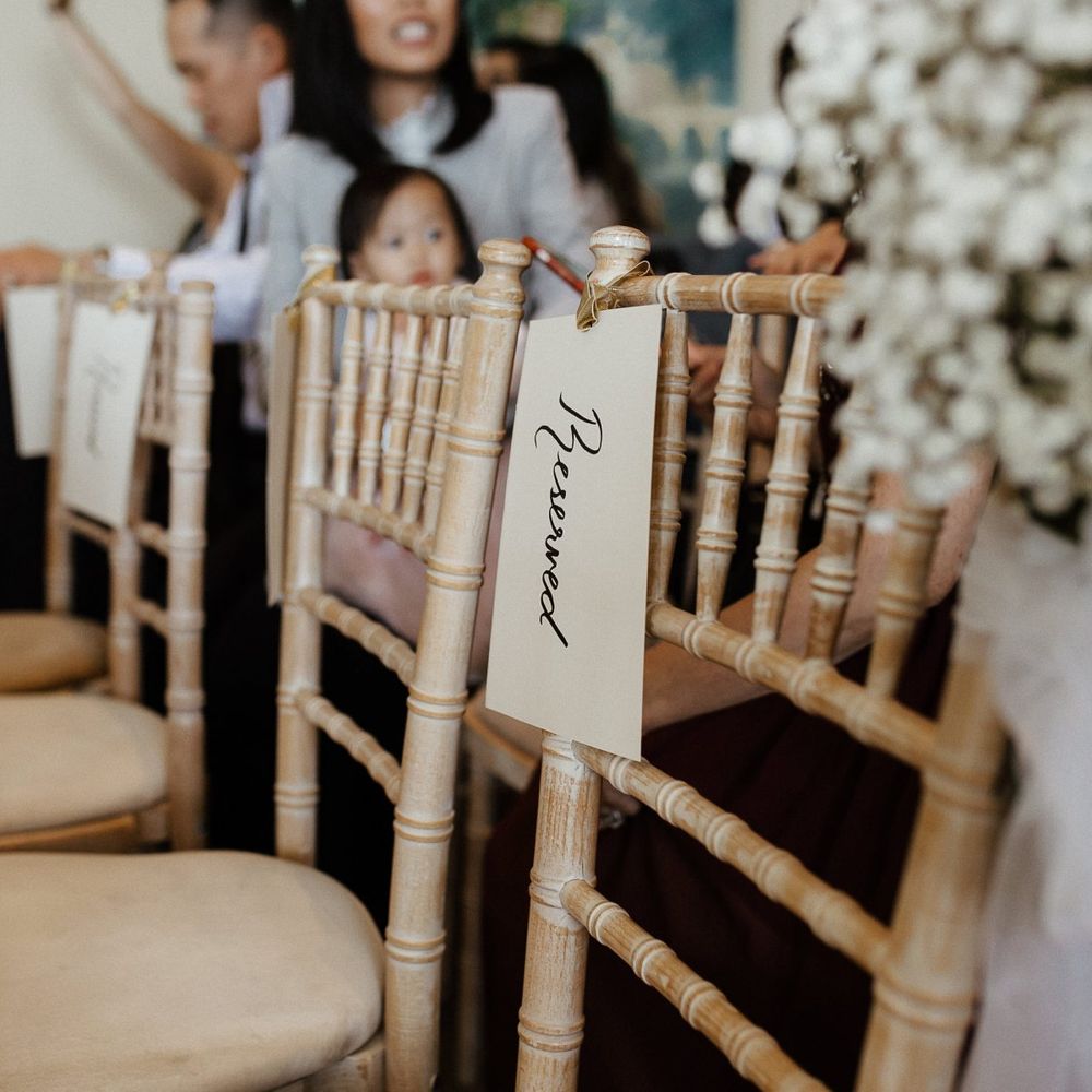 Wedding chairs with flower decor  during ceremony