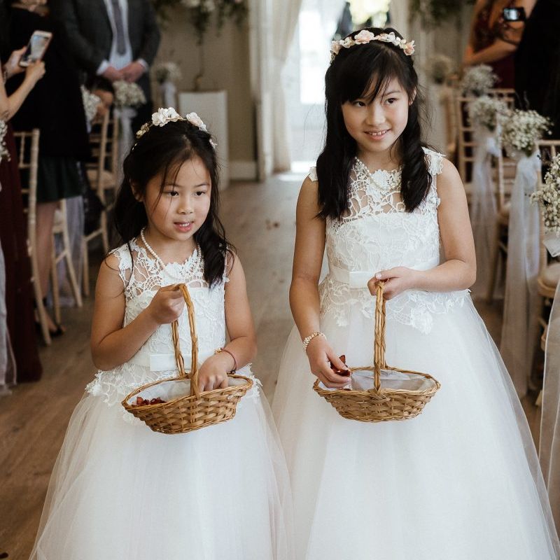 Flower girls during wedding ceremony in Essex