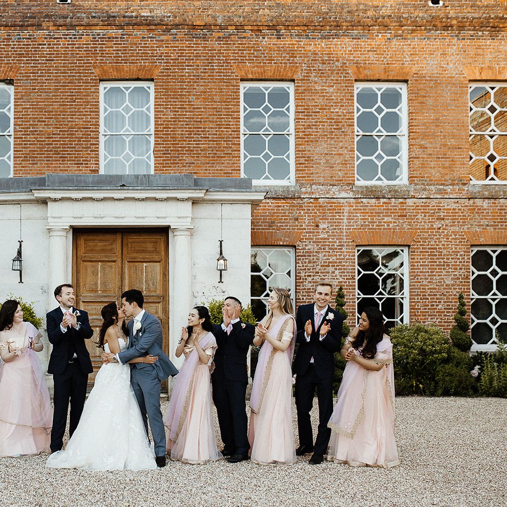 Bridal party and groomsmen with bride and groom
