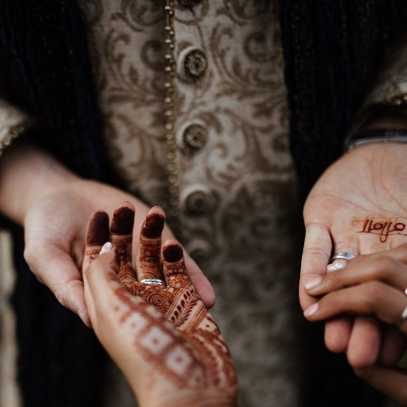 Bridal henna tattoo and navy Indian wedding dress