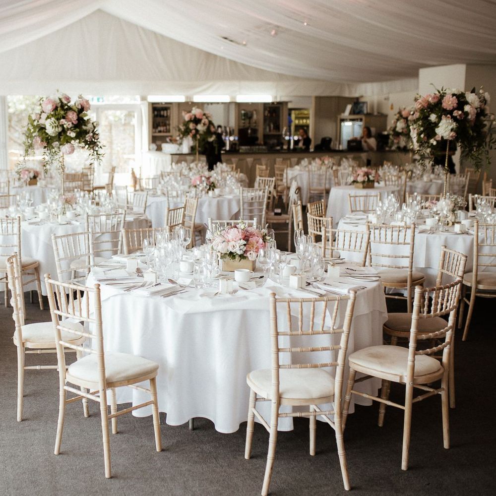 Wedding table setting with pink wedding flowers