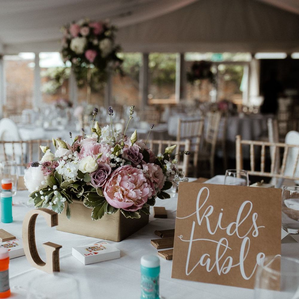 Dedicated kids table at fusion wedding
