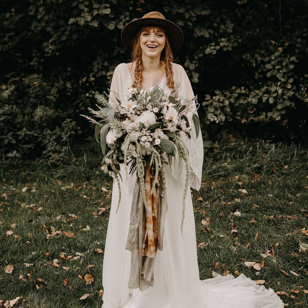 Boho Bride in Lade Wedding Dress &amp; Oversized Bridal Bouquet with Ribbon &amp; Foliage | Nude Bohemian Wedding Inspiration by Wonderland Invites &amp; Rock The Day Styling | Kelsie Low Photography