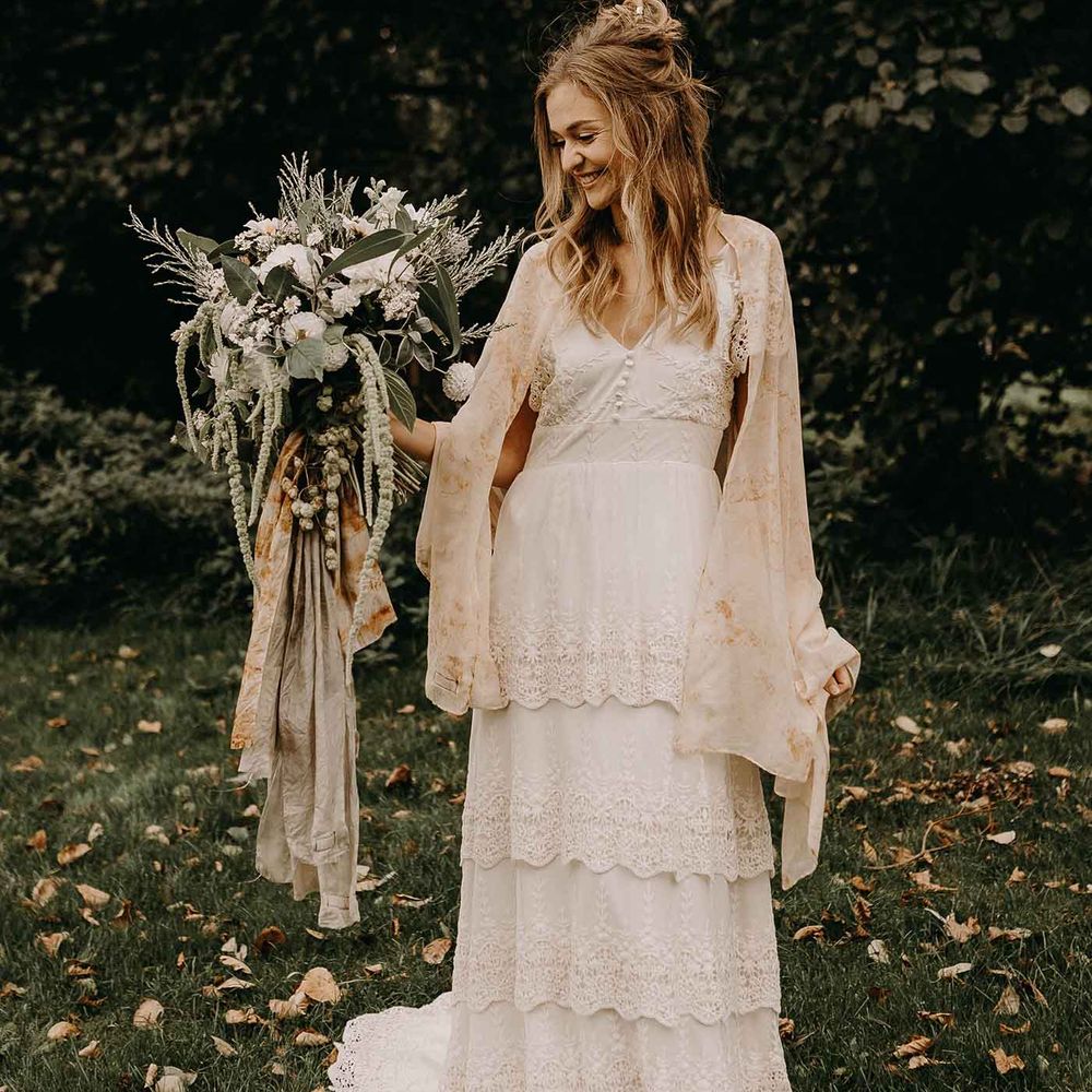 Boho Bride in Lade Wedding Dress &amp; Oversized Bridal Bouquet with Ribbon &amp; Foliage | Nude Bohemian Wedding Inspiration by Wonderland Invites &amp; Rock The Day Styling | Kelsie Low Photography