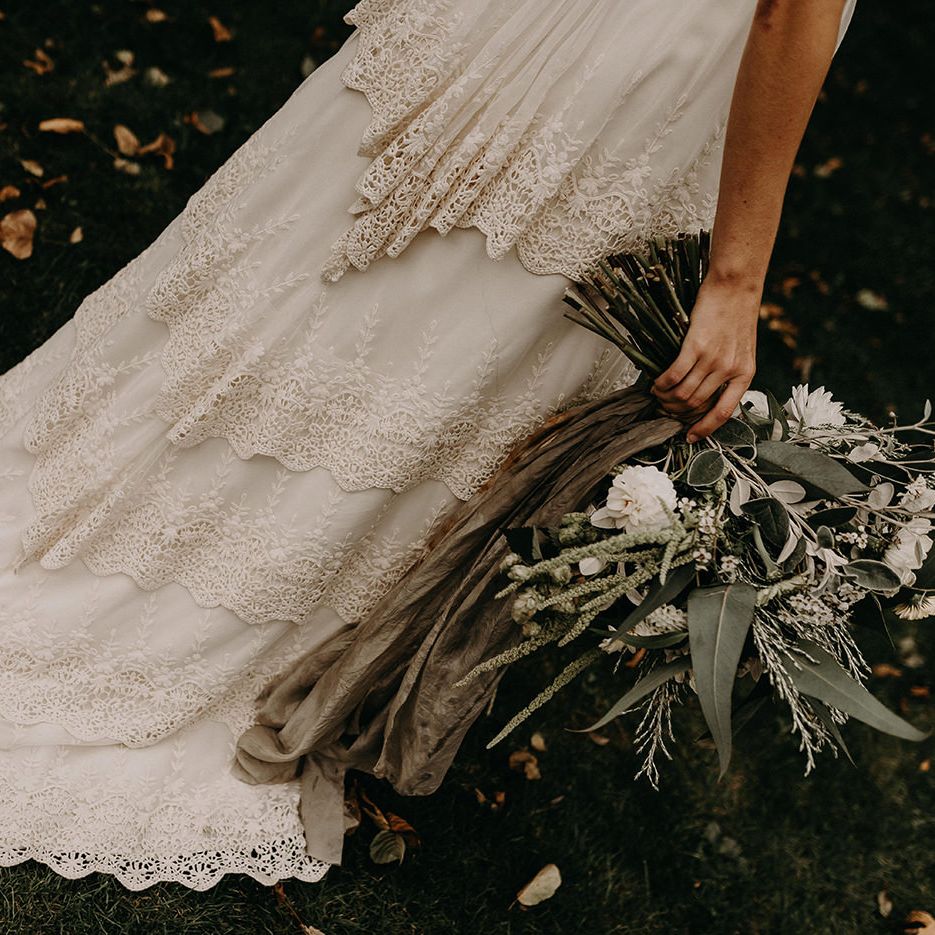 Boho Bride in Lade Wedding Dress &amp; Oversized Bridal Bouquet with Ribbon &amp; Foliage | Nude Bohemian Wedding Inspiration by Wonderland Invites &amp; Rock The Day Styling | Kelsie Low Photography