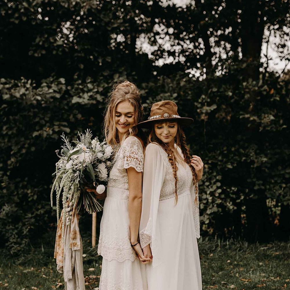 Boho Brides in Lade Wedding Dresses &amp; Oversized Bridal Bouquet with Ribbon &amp; Foliage | Nude Bohemian Wedding Inspiration by Wonderland Invites &amp; Rock The Day Styling | Kelsie Low Photography