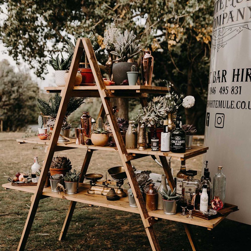 The White Mule Drinks Trailer with vintage Step Ladder Shelving Display | Nude Bohemian Wedding Inspiration by Wonderland Invites &amp; Rock The Day Styling | Kelsie Low Photography