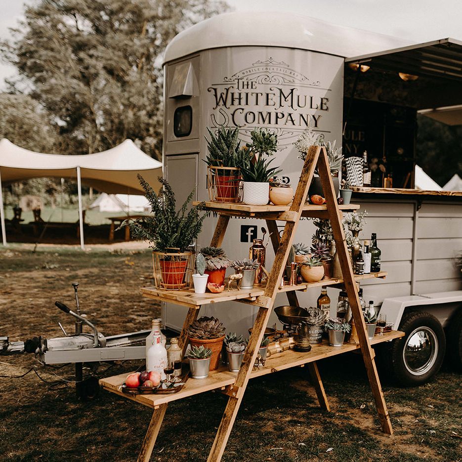 The White Mule Drinks Trailer with vintage Step Ladder Shelving Display | Nude Bohemian Wedding Inspiration by Wonderland Invites &amp; Rock The Day Styling | Kelsie Low Photography