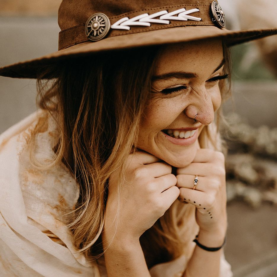 Boho Bride in Lace Dress &amp; Hat | Drapes, Dried Flowers &amp; Macrame Decor | Wooden Table with Candle Sticks &amp; Greenery Garland | Nude Bohemian Wedding Inspiration by Wonderland Invites &amp; Rock The Day Styling | Kelsie Low Photography