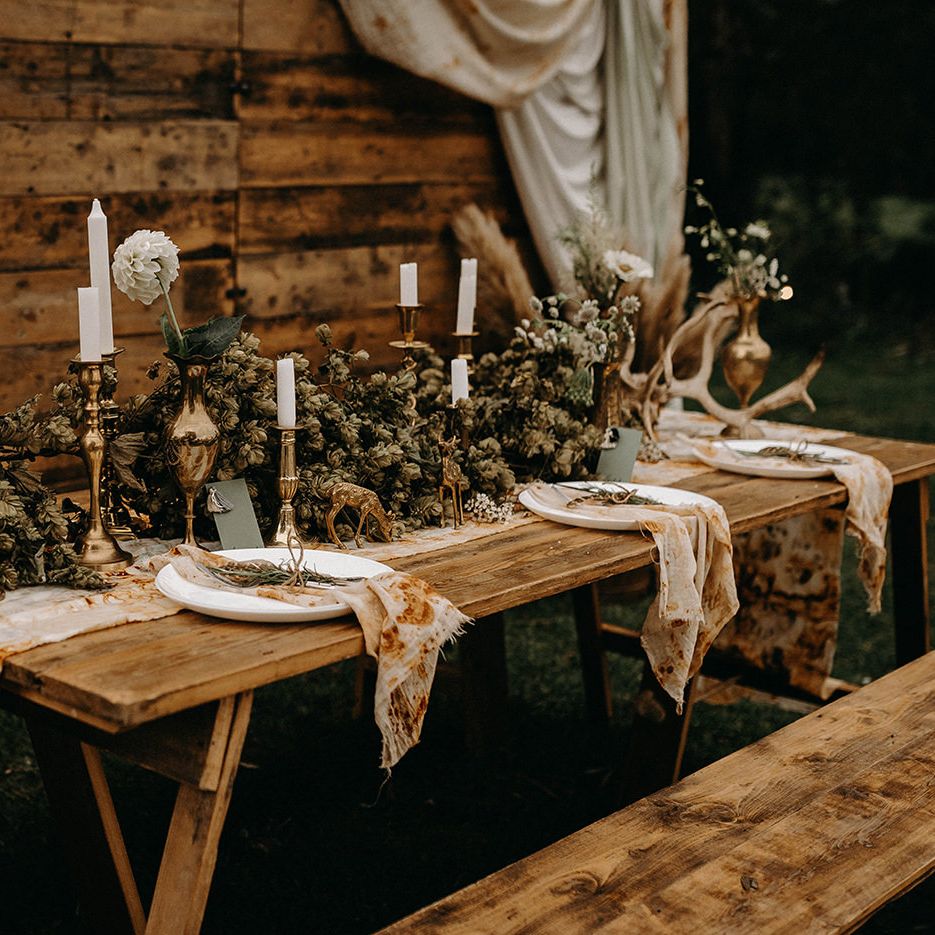 Wooden Backdrop with Drapes, Dried Flowers &amp; Macrame Decor | Wooden Table with Candle Sticks &amp; Greenery Garland | Nude Bohemian Wedding Inspiration by Wonderland Invites &amp; Rock The Day Styling | Kelsie Low Photography
