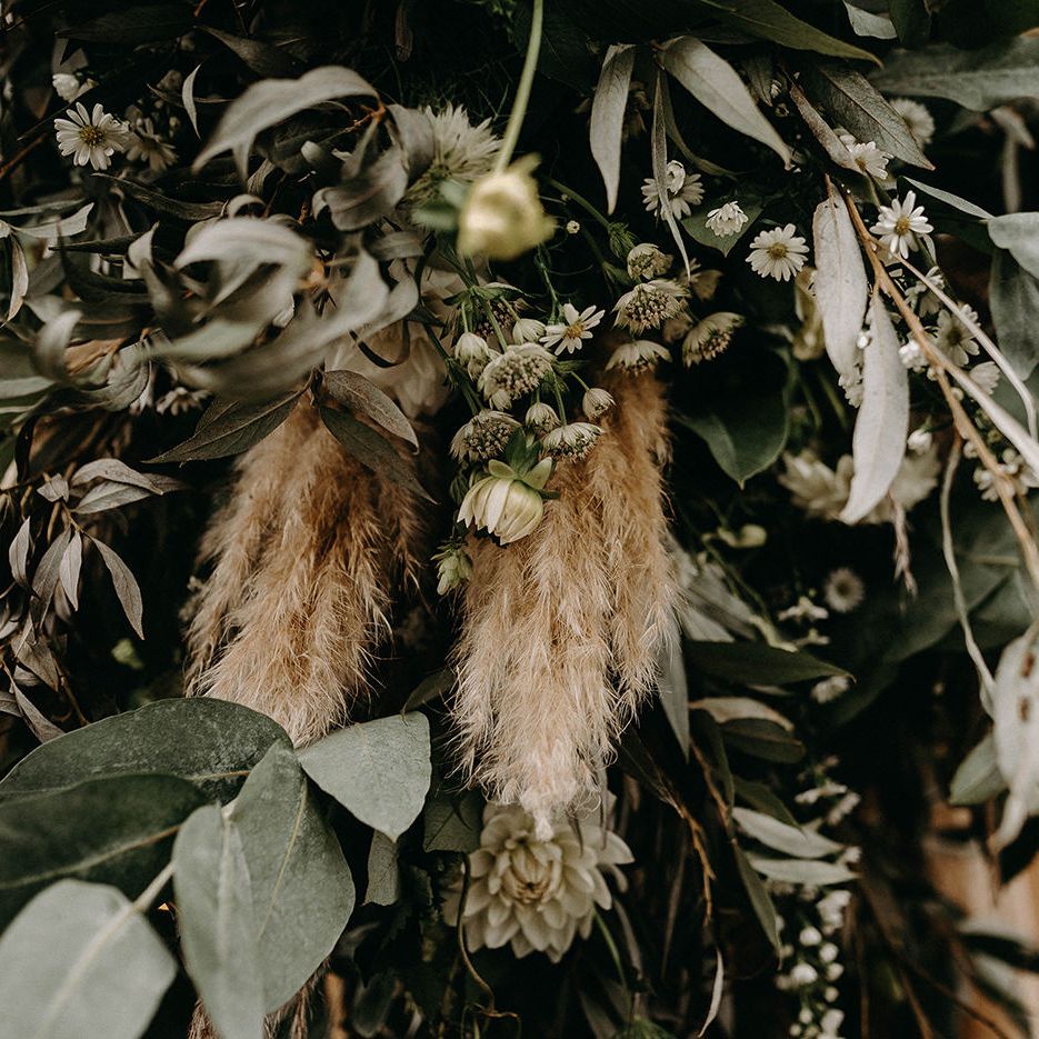 Dried Wedding Flowers with Pampas Grass | Wooden Table with Candle Sticks &amp; Greenery Garland | Nude Bohemian Wedding Inspiration by Wonderland Invites &amp; Rock The Day Styling | Kelsie Low Photography