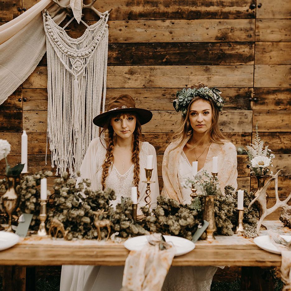 Boho Brides in Lace Dresses, Hats &amp; Succulent Flower Crowns | Drapes, Dried Flowers &amp; Macrame Decor | Wooden Table with Candle Sticks &amp; Greenery Garland | Nude Bohemian Wedding Inspiration by Wonderland Invites &amp; Rock The Day Styling | Kelsie Low Photography