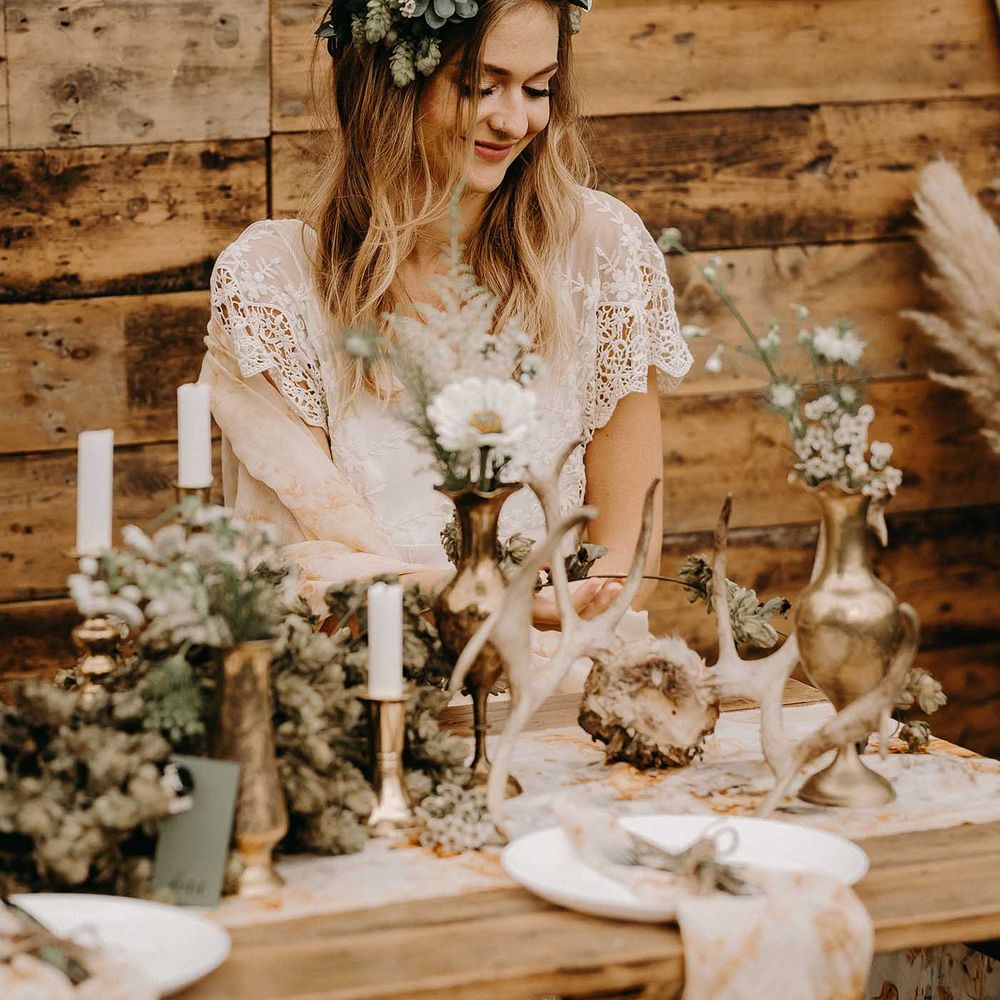 Boho Bride in Lace Dress &amp; Succulent Flower Crowns | Drapes, Dried Flowers &amp; Macrame Decor | Wooden Table with Candle Sticks &amp; Greenery Garland | Nude Bohemian Wedding Inspiration by Wonderland Invites &amp; Rock The Day Styling | Kelsie Low Photography