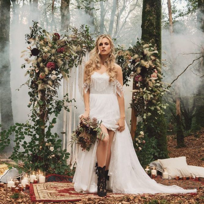 Boho Bride in  Cold Shoulder Wedding Dress with Fringe Detail and Black Lace Wedding Boots