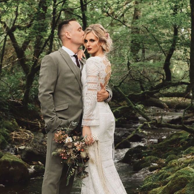Bride in Lace Wedding Dress with Tie Back Detail