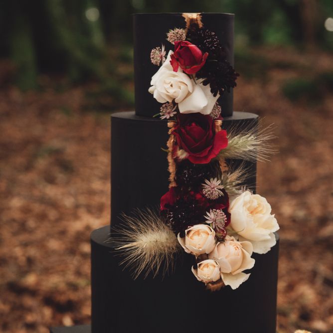 Black Square Wedding Cake with Cascading Wedding Flowers