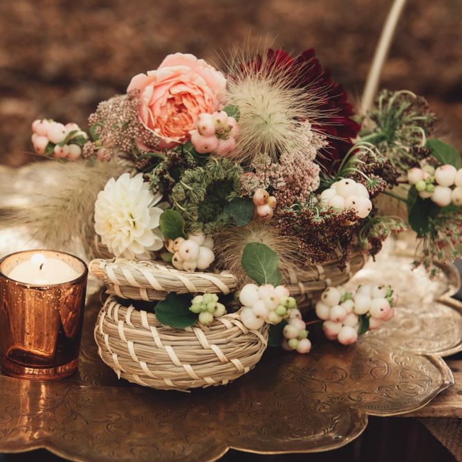Gold Platter and Wicker Basket Filled with Wedding Flowers