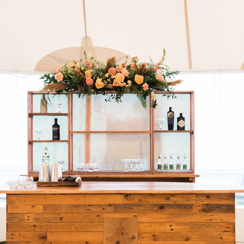 Wooden Bar within a PapaKåta Sperry Tent Wedding