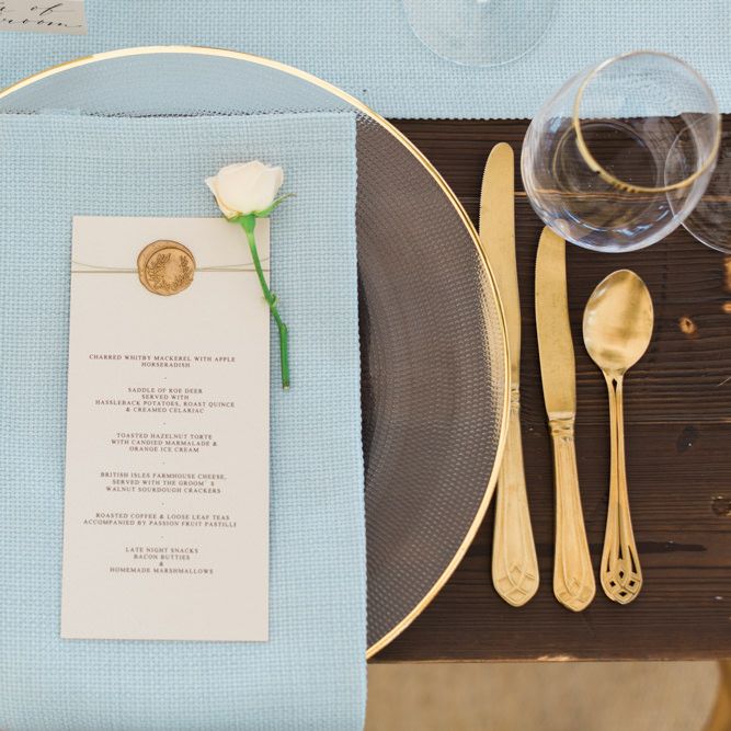 Pretty Glass Platter &amp; Gold Cutlery Place Setting with Blue Linen Napkin.