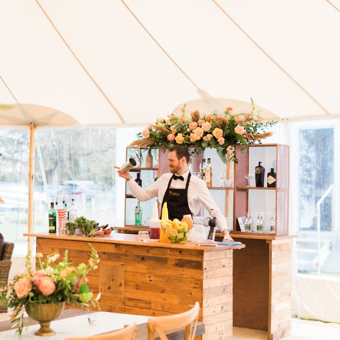 Wooden Bar with Signature Cocktails by Mix and Twist.