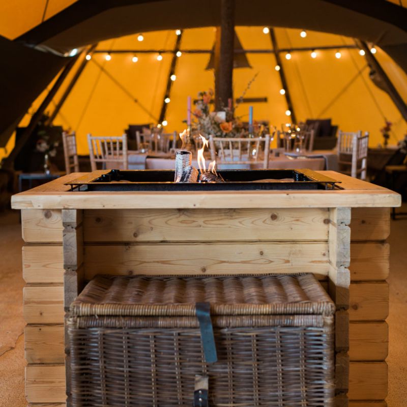 Wooden Fire pit within a PapaKåta Giant Teepee