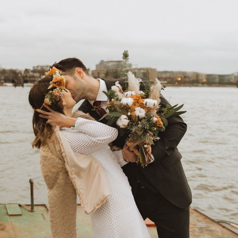 Hammersmith riverside wedding with 70s dress and rose and cotton flower bouquet