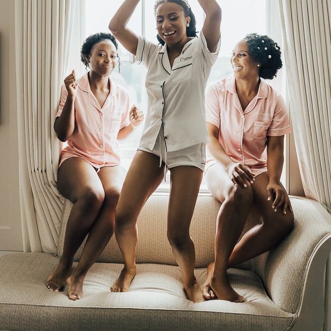 Wedding morning bridal preparations with bridal party in getting ready pyjamas